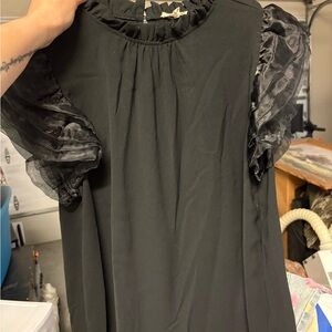 Elegant Black Dress with Sheer Sleeves